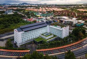 an overhead view of a building in a city at Ramada Plaza by Wyndham Chao Fah Phuket in Phuket Town