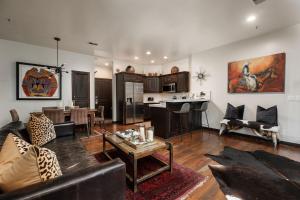 a living room with a couch and a table at LIFT LODGE 102 condo in Park City