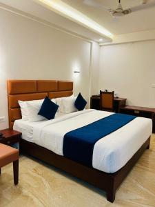 Llit o llits en una habitació de Fourmens Residency