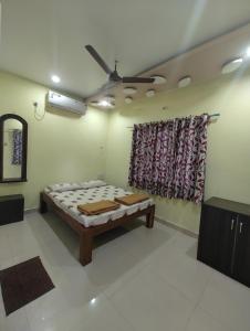 Letto o letti in una camera di Konkan Villa Dream