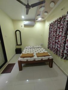 Letto o letti in una camera di Konkan Villa Dream