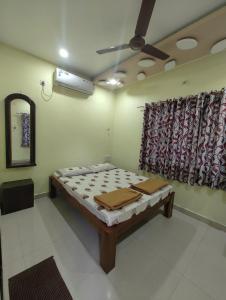 Letto o letti in una camera di Konkan Villa Dream