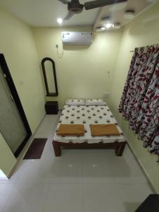Letto o letti in una camera di Konkan Villa Dream