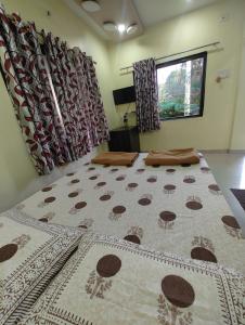 Letto o letti in una camera di Konkan Villa Dream