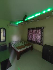 Letto o letti in una camera di Konkan Villa Dream