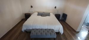 Cama ou camas em um quarto em Pilgrim's Rest - Descanso del Peregrino