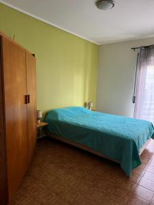 Katil atau katil-katil dalam bilik di Apartament Pedro&Pérolla