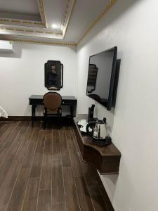TV a/nebo společenská místnost v ubytování Trung Huyền Hotel