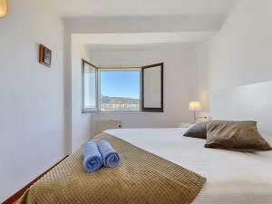 Posteľ alebo postele v izbe v ubytovaní Apartment Rhodas by Interhome