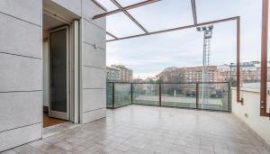 an open balcony with a view of a city at Italianway - Albani 20 in Milan