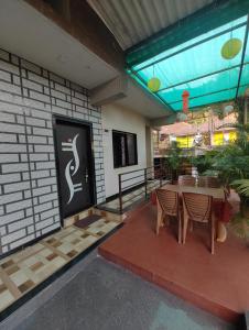 TV o dispositivi per l'intrattenimento presso Konkan Villa Dream