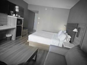 Säng eller sängar i ett rum på Radisson Hotel Montreal Airport