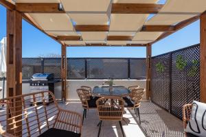 A balcony or terrace at The Old Town Gem