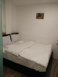 Postel nebo postele na pokoji v ubytování 7 Hotel