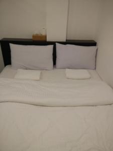 Postel nebo postele na pokoji v ubytování 7 Hotel