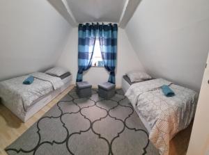 Postel nebo postele na pokoji v ubytování Ferienhaus Alexandra