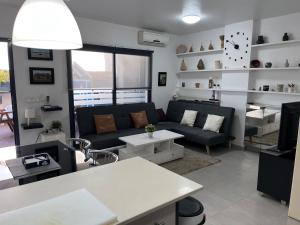 Posedenie v ubytovaní PLAYA ALMARDA,PISCINA,2 TERRAZAS,WIFI,PARKING,BBQ,TRANQUILo