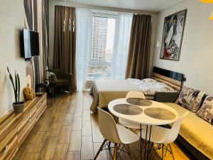 Televisyen dan/atau pusat hiburan di Apartment SMART PLAZA OBOLON'