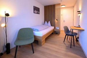 Ένα ή περισσότερα κρεβάτια σε δωμάτιο στο Hotel St. Josefshaus Engelberg