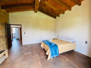 a bedroom with a bed in a room at Casa Las Animas Malinalco in Malinalco