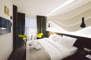 Postel nebo postele na pokoji v ubytování Dunetton - self check-in hotel + 24 fotografií