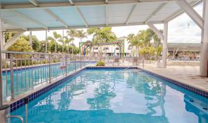 a pool at a resort with a slide at DiRoma Fiori Hotel - HUP CALDAS NOVAS in Caldas Novas