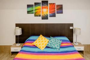 A bed or beds in a room at L'ANFORA DELLE MURELLE