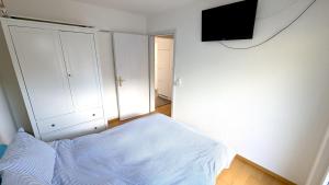 Lake Lucerne Paradise Apartment客房内的一张或多张床位