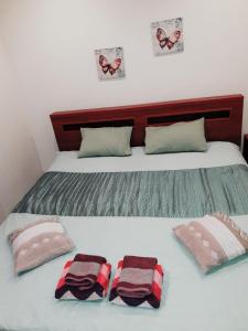 Кровать или кровати в номере Green Park Domina apartment