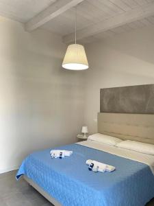 Postel nebo postele na pokoji v ubytování B&B Resort El Bisagrà