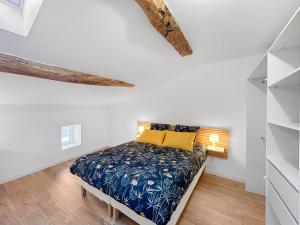Ένα ή περισσότερα κρεβάτια σε δωμάτιο στο Le Loft de Saintonge