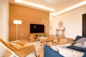 A seating area at Denis 2BR Apartment in Batroun