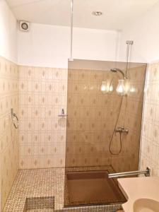 a bathroom with a shower and a sink at Maison de 3 chambres avec vue sur la ville jardin clos et wifi a Angerville in Angerville