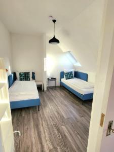 Katil atau katil-katil dalam bilik di Haus an der Weser - 24/7 Check-In