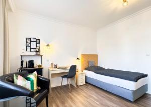 Ein Bett oder Betten in einem Zimmer der Unterkunft AhrPart Hotel Central