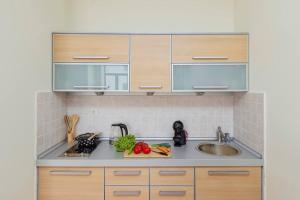 Kuchyň nebo kuchyňský kout v ubytování 1-Bedroom Flat on the Main Square in the Old Town