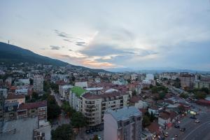an aerial view of a city with buildings at GM SkyView Luxury Flatiron apartment Skopje in Skopje