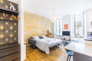 Postel nebo postele na pokoji v ubytování Appartement charmant Bordeaux centre