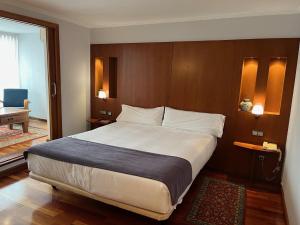 Postel nebo postele na pokoji v ubytování Hotel Gran Regente