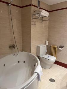 Koupelna v ubytování Hotel Gran Regente