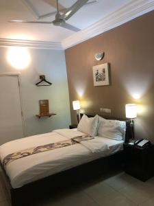 Ліжко або ліжка в номері EKA ELITE HOTEL