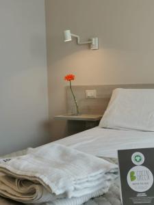 Postel nebo postele na pokoji v ubytování Green Guest House