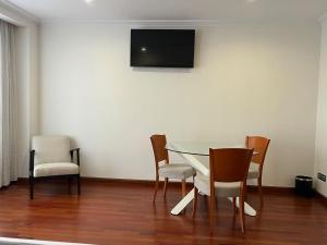 TV a/nebo společenská místnost v ubytování Hotel Gran Regente