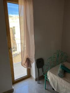 Postel nebo postele na pokoji v ubytování Intra Moenia
