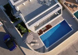 Bazén v ubytování Paradise Sea View Villa nebo v jeho okolí