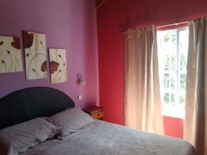 En eller flere senge i et værelse på Chalet sueños del mar