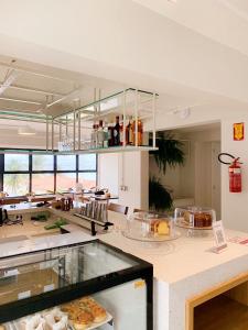 a kitchen with a counter with some food on it at Liiv Hub in Natal