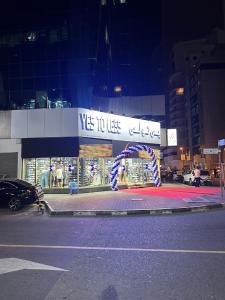 a building with a sign that says yes to use at Loft Partition close to Mall of Emirates in Dubai