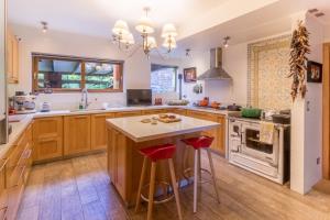 Kuchyň nebo kuchyňský kout v ubytování B&B Puerto Varas Playa Venado
