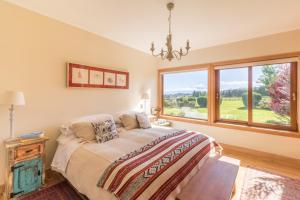 Postel nebo postele na pokoji v ubytování B&B Puerto Varas Playa Venado